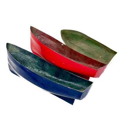 Lot 506 - Three painted fibreglass model boat hulls.