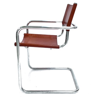 Lot 516 - A set of four Bauhaus-style chrome and leather cantilever dining chairs.