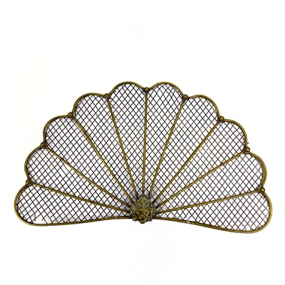 Lot 154 - A victorian brass fan shape spark guard.