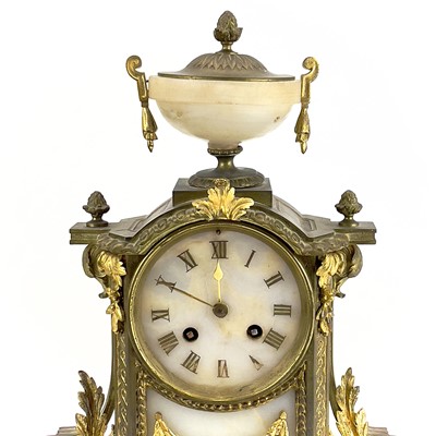 Lot 1718 - A French gilt metal and alabaster eight day mantel clock.
