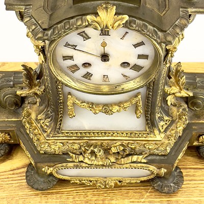 Lot 1718 - A French gilt metal and alabaster eight day mantel clock.