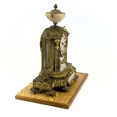 Lot 1718 - A French gilt metal and alabaster eight day mantel clock.