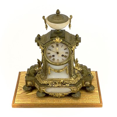 Lot 1718 - A French gilt metal and alabaster eight day mantel clock.