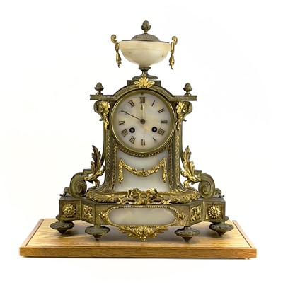 Lot 1718 - A French gilt metal and alabaster eight day mantel clock.
