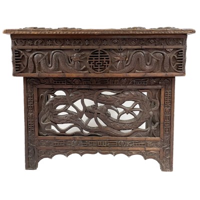 Lot 703 - A Chinese carved hardwood occasional table, early 20th century.