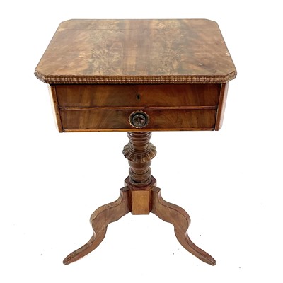 Lot 1855 - A Continental figured mahogany work table.