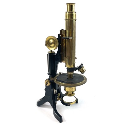 Lot 85 - A lacquered brass and brass Petrological microscope by J Swift & Sons early 20th century.