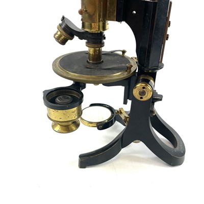 Lot 85 - A lacquered brass and brass Petrological microscope by J Swift & Sons early 20th century.
