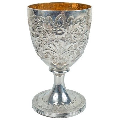 Lot 149 - A George III silver embossed and chased pedestal cup by John Emes.