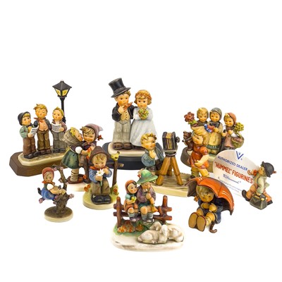 Lot 901 - A collection of ten Hummel porcelain figures.