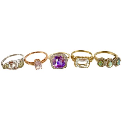 Lot 344 - Five contemporary 9ct hallmarked gold gem set rings.