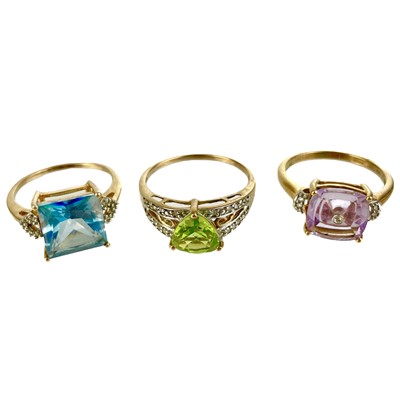 Lot 558 - Three contemporary 9ct hallmarked gold gem and diamond set rings.