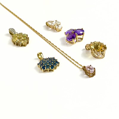 Lot 254 - Six contemporary 9ct hallmarked gold gem set pendants.