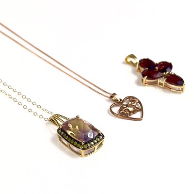 Lot 333 - Three contemporary 9ct hallmarked gold gem and diamond set pendants.