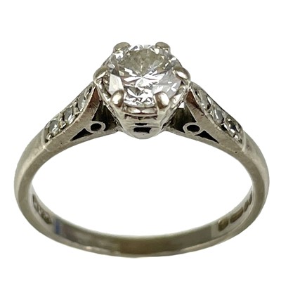 Lot 318 - A modern 18ct white gold 0.60ct diamond solitaire ring.