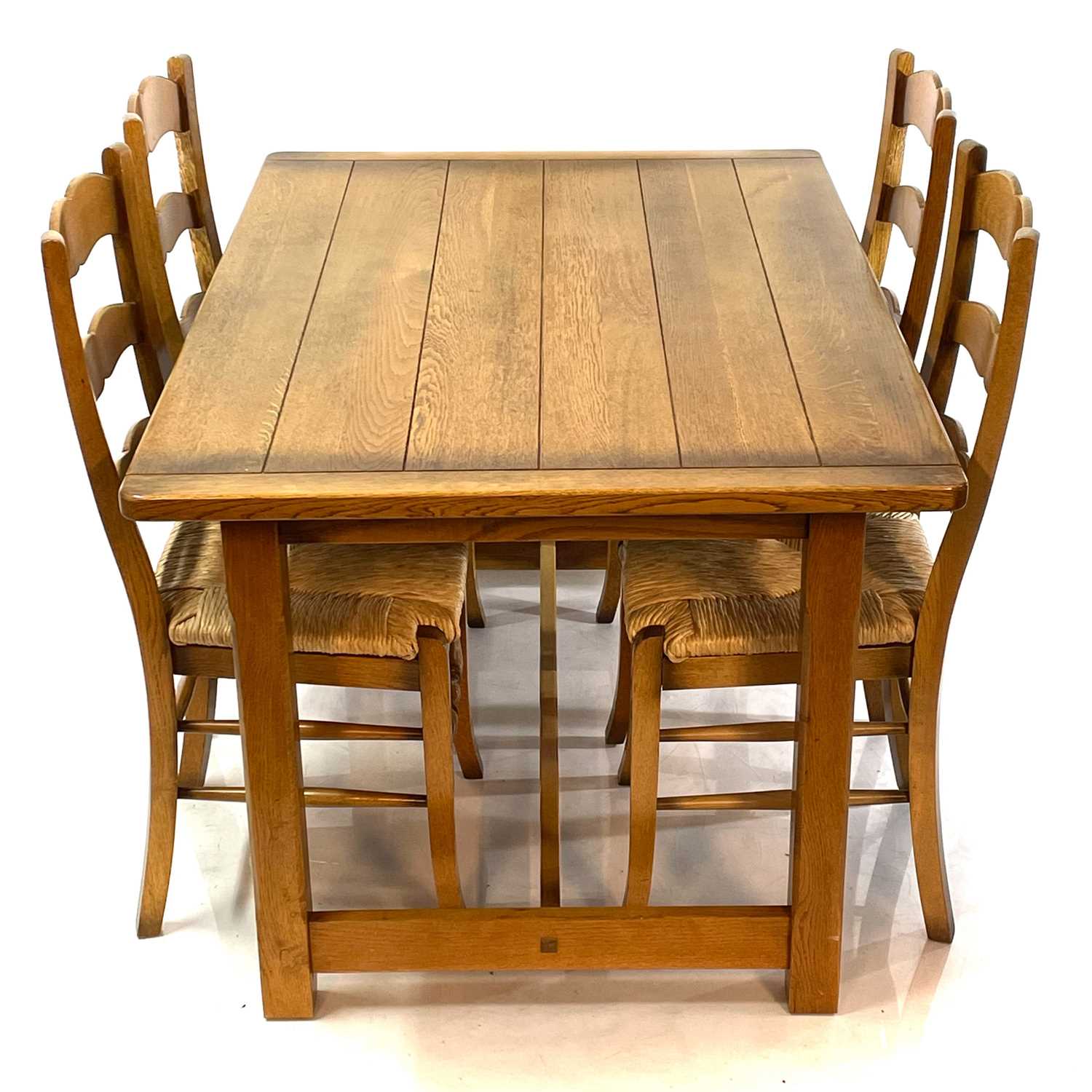 Lot 1888 An oak rectangular dining table and four
