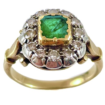 Lot 88 - An early 20th century high purity gold emerald and diamond cluster ring.