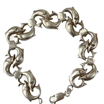 Lot 456 - A modern 925 silver dolphin bracelet.