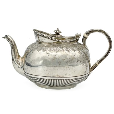 Lot 268 - A Victorian silver bachelor teapot by Richard Martin & Ebenezer Hall.