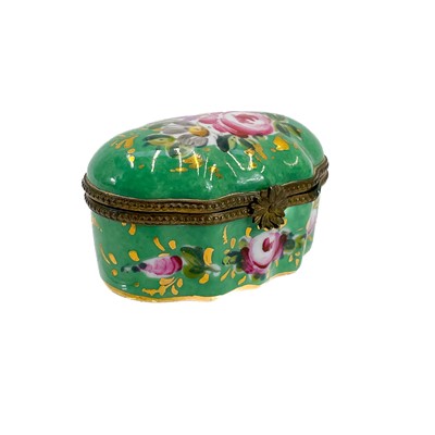 Lot 885 - A French Limoges porcelain patch/pill box.