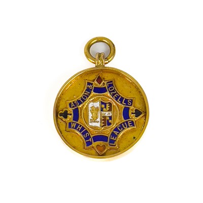 Lot 32 - A 1930's 9ct and enamel medallion fob.