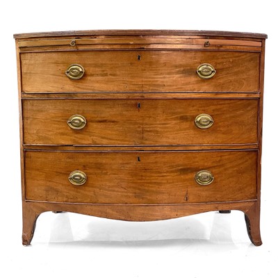 Lot 1921 - A 19th century mahogany bow front chest.