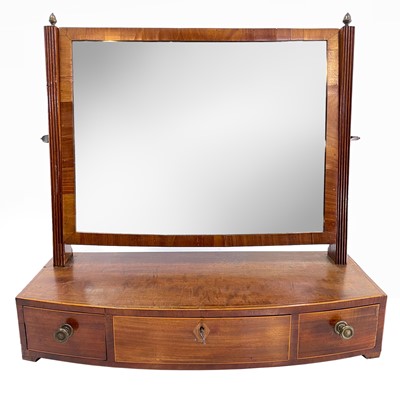 Lot 1922 - A late George III mahogany swing toilet mirror.