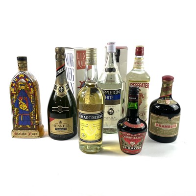 Lot 252 - A mixed assortment of bottled spirits.