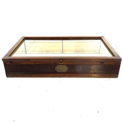 Lot 1928 - A mahogany and brass bound tabletop display cabinet.