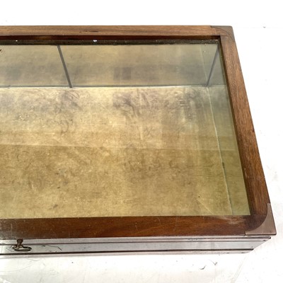 Lot 1928 - A mahogany and brass bound tabletop display cabinet.