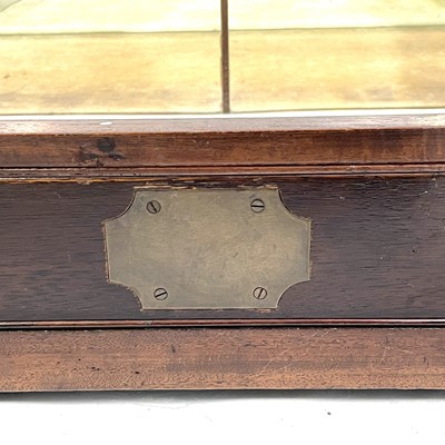 Lot 1928 - A mahogany and brass bound tabletop display cabinet.