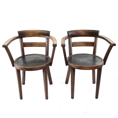 Lot 1931 - A pair of continental beech cafe elbow chairs.