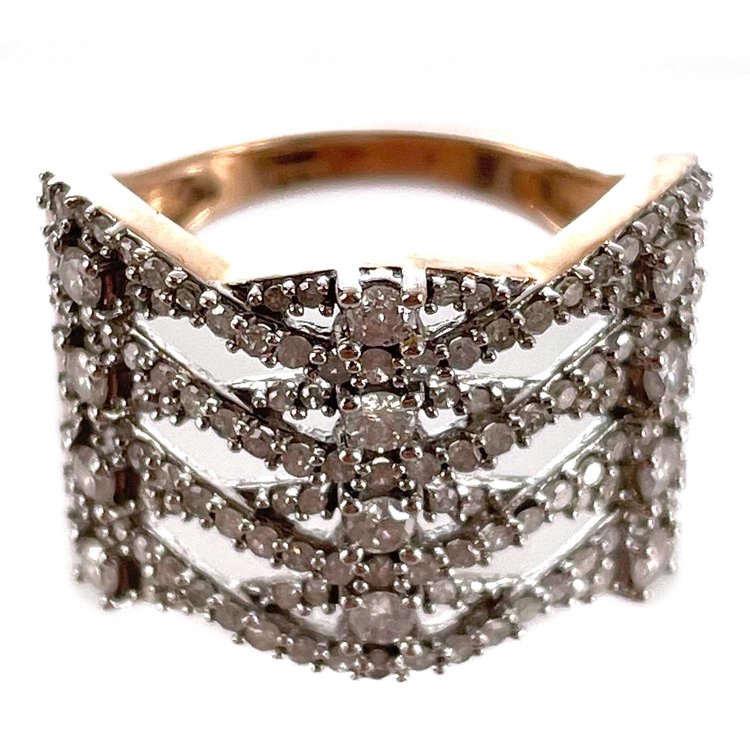 Lot 174 - A contemporary 9ct rose gold diamond open