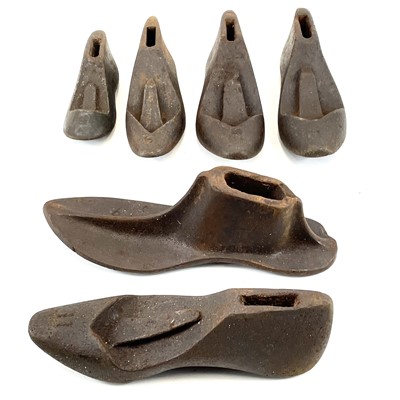 Lot 241 - A collection of 19th and 20th century iron shoe lasts.