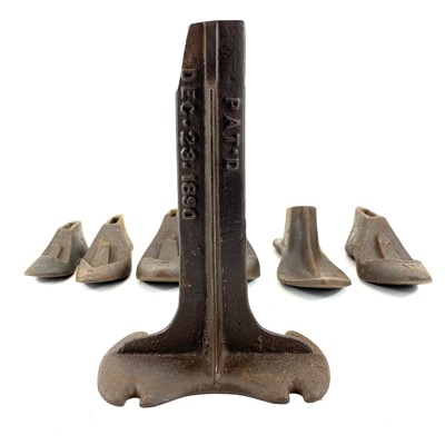 Lot 241 - A collection of 19th and 20th century iron shoe lasts.