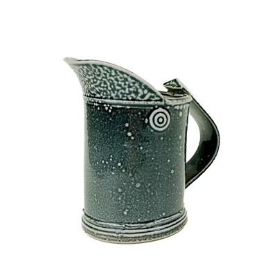 Lot 840 - A small salt glazed studio pottery jug by Wally Keeler.