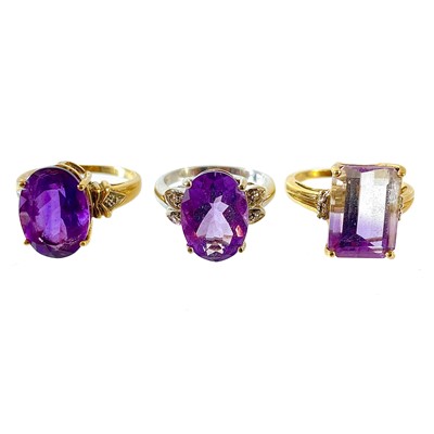 Lot 113 - Three contemporary 9ct gold amethyst and small diamond set dress rings.