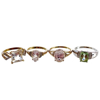 Lot 143 - Four 9ct contemporary gem and small diamond set dress rings.