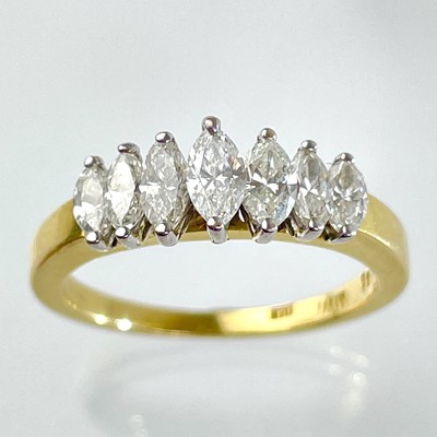 Lot 374 - An 18ct gold marquise cut diamond seven stone ring.