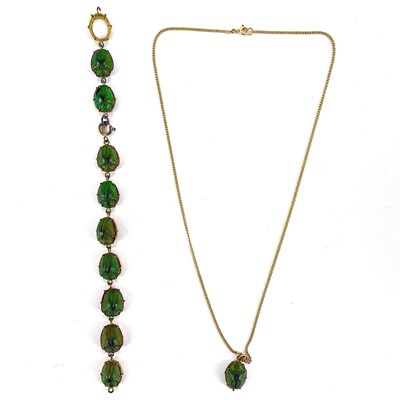 Lot 202 - A Scarab beetle gold plated bracelet and a Scarab pendant with 15ct chain.