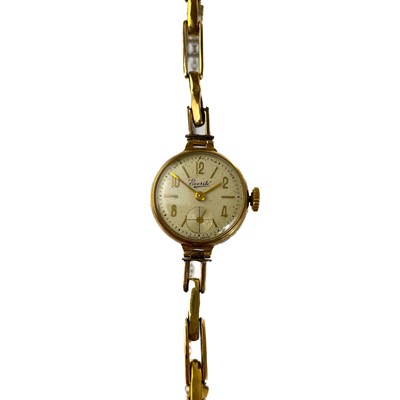 Lot 502 - A 1950's Everite 9ct ladies manual wind bracelet wristwatch.