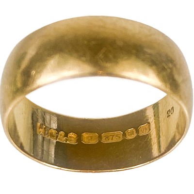 Lot 165 - A 9ct gold band ring.