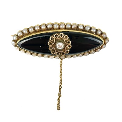 Lot 264 - A Victorian high purity gold diamond, onyx and pearl set mourning brooch.