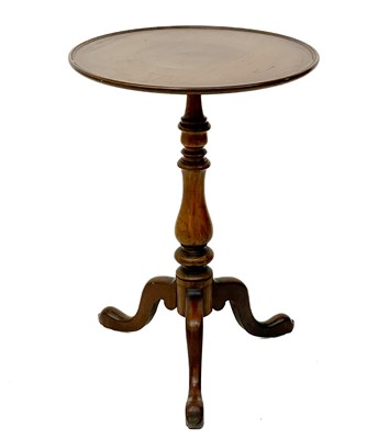 Lot 1823 - A Georgian mahogany circular tripod table.