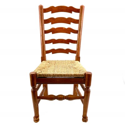 Lot 135 - An Arts and Crafts style ash and elm ladder back child's chair.