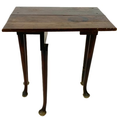 Lot 1834 - A Georgian mahogany side table with a single drop leaf.