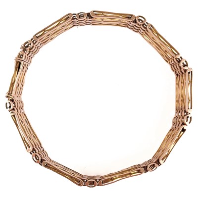 Lot 5 - A 9ct rose gold gatelink bracelet.