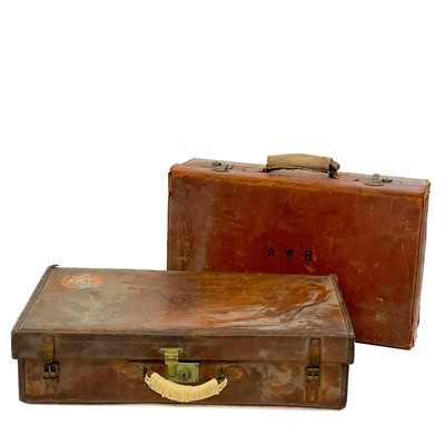 Lot 1602 - An early 20th century leather suitcase.