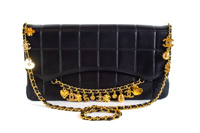 Lot 527 - A Chanel chocolate bar quilted lambskin charm handbag, circa 2002-2003.