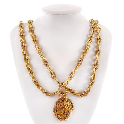 Lot 535 - A Chanel gold plated double row long pendant chain necklace.